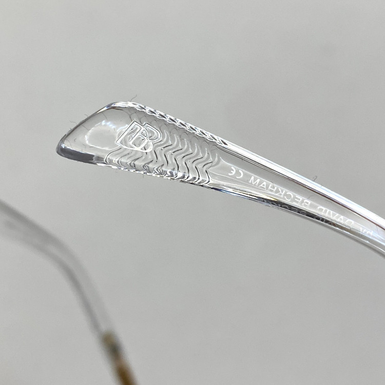 عینک آفتابی مردانه و زنانه دیوید بکام به همراه فول پک 28010 شفاف دسته طلایی