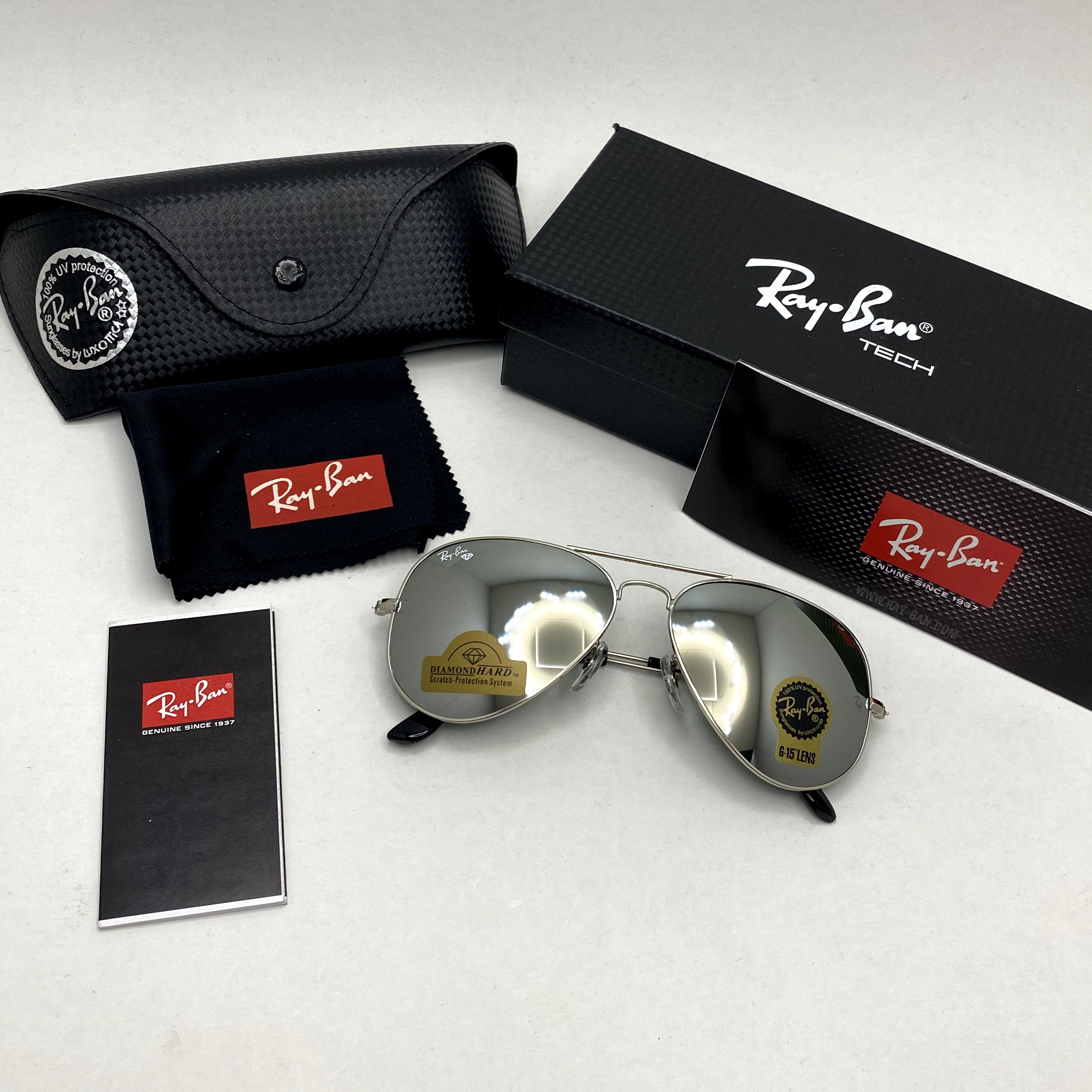 عینک آفتابی خلبانی AVIATOR ریبن rayban شیشه سنگ ایتالیایی آینه ای فریم نقره ای سایز 3025 فول پک