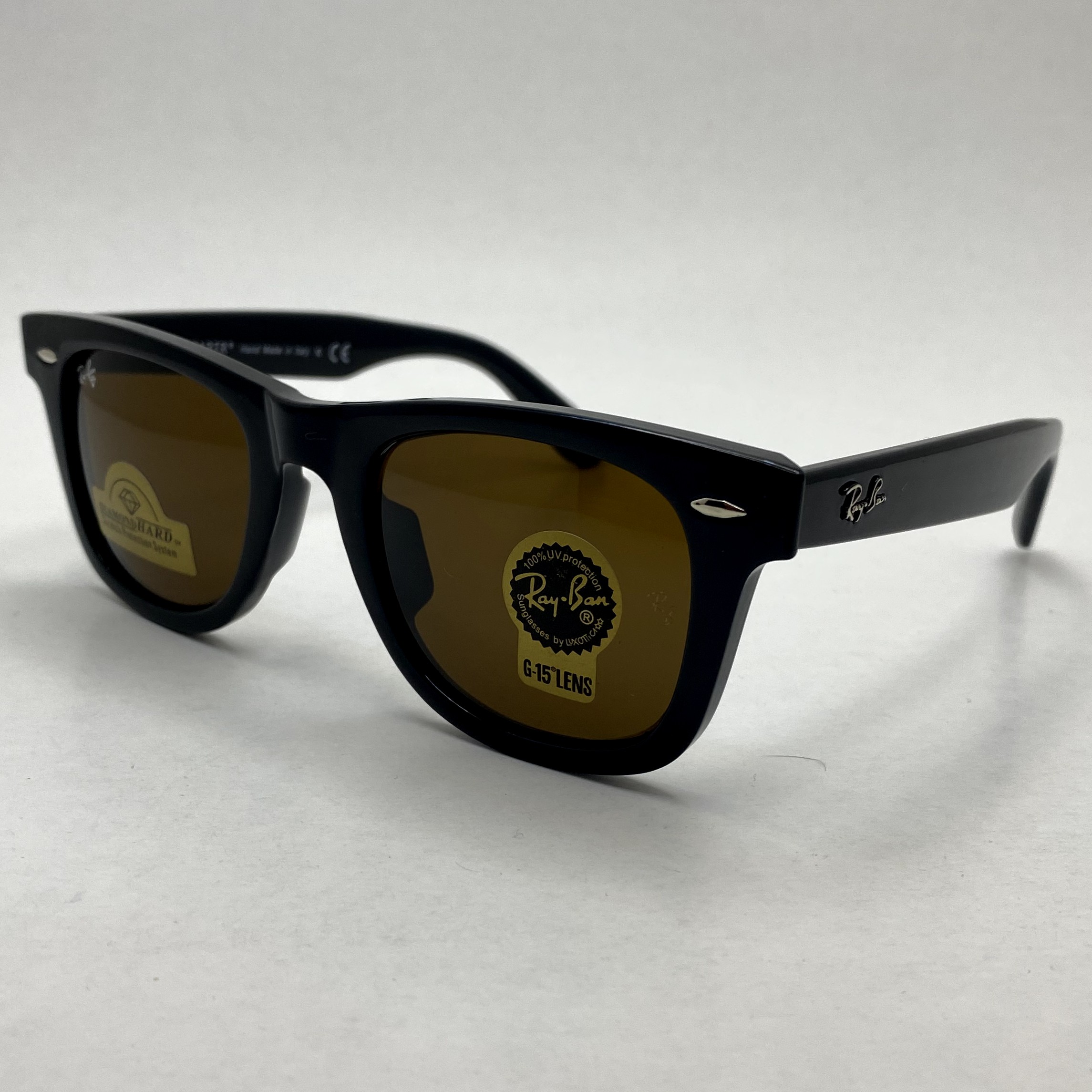 عینک آفتابی ویفرر ریبن rayban WAYFARER شیشه سنگ قهوه ای فریم براق سایز 50 به همراه پک کامل اورجینال RB2140