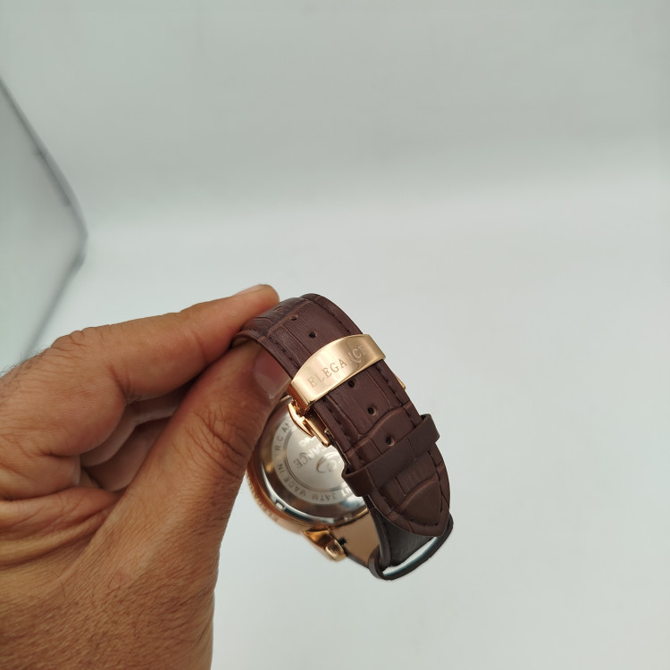 ساعت مردانه موتور ژاپن چرمی قاب و قفل استیل برند الگانس.