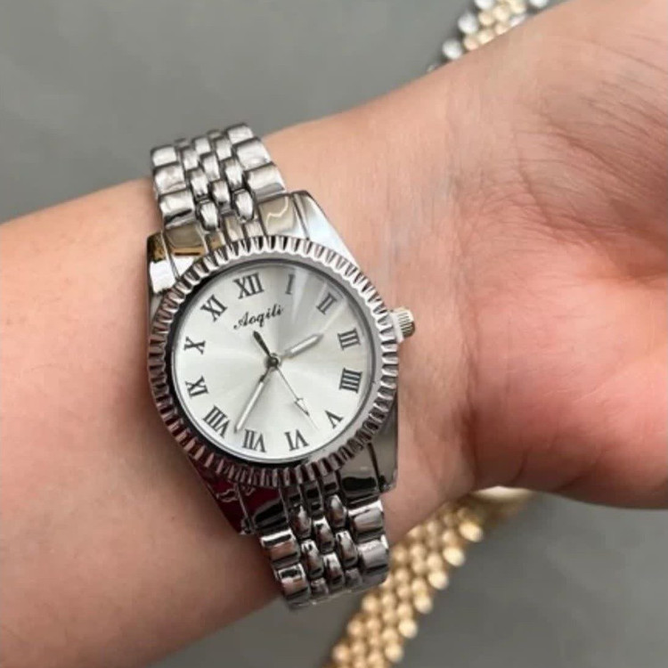 ساعت زنانه نقره ای صفحه نقره ای طرح رولکس