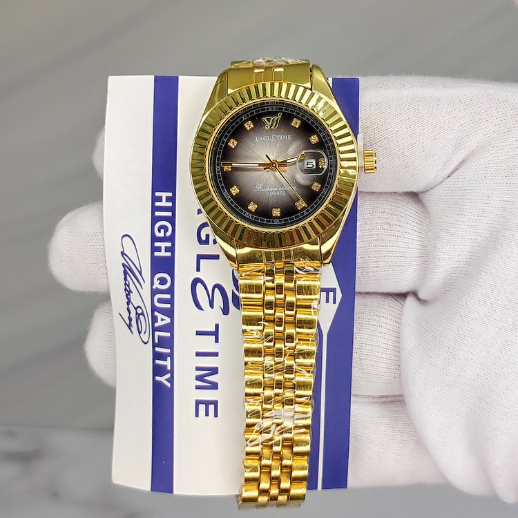 ساعت زنانه اورجینال کیفیت عالی برند EAGLE TIME با کارت اصالت برند طلایی صفحه خاص فیلی مشکی