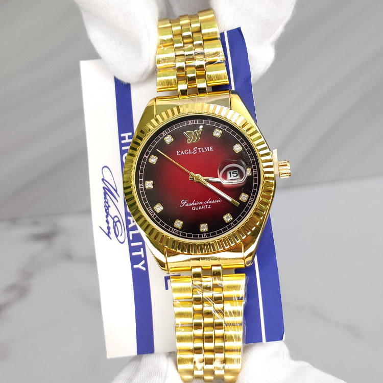 ساعت مردانه اورجینال کیفیت عالی برند EAGLE TIME با کارت اصالت برند طلایی صفحه شرابی