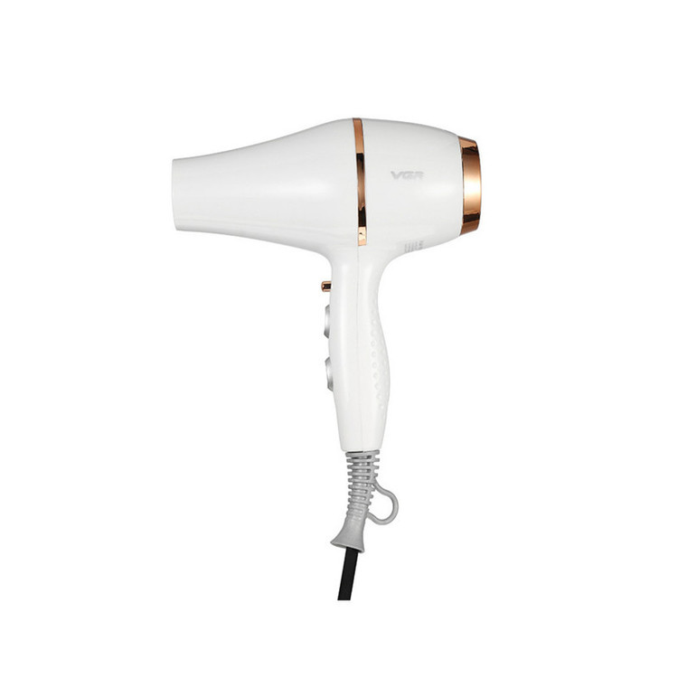 سشوار حرفهای 2200 وات وی جی ار مدل V-414، موتور AC، وزن 802 گرم، المنت سرامیک تورمالین، دارای سری متمرکزکننده باریک، متمرکزکننده پهن با ویژگی صافکنندگی، حجمدهندگی، با قابلیت تنظیم دما، فناوری تولید یون
