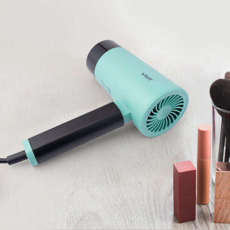 سشوار مسافرتی 1600 وات وی جی ار مدل V-426، موتور DC، وزن 600 گرم، المنت فلز، دارای سری متمرکزکننده باریک با ویژگی صافکنندگی، با قابلیت باد سرد