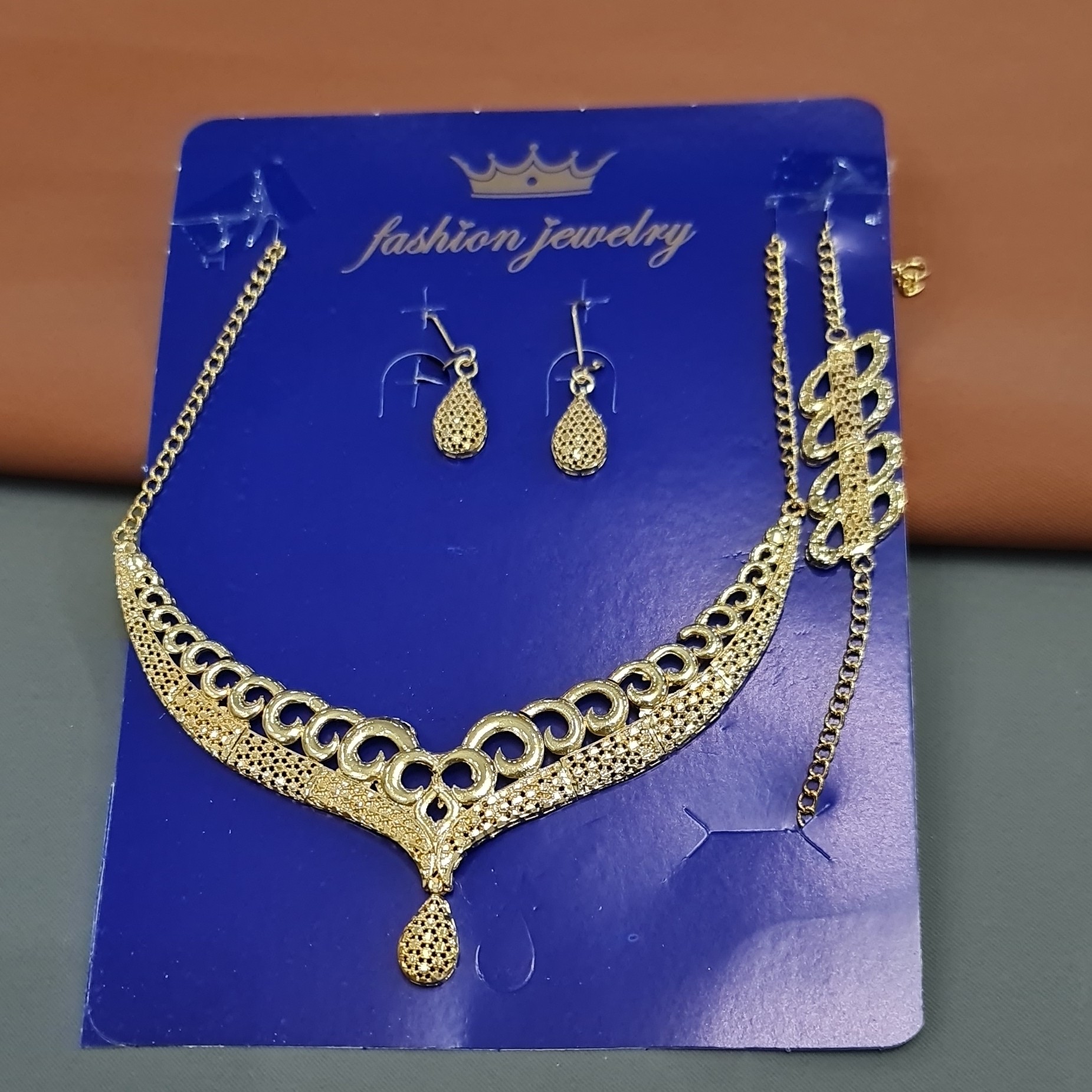 سرویس زیتونی زنانه طرح طلا1012