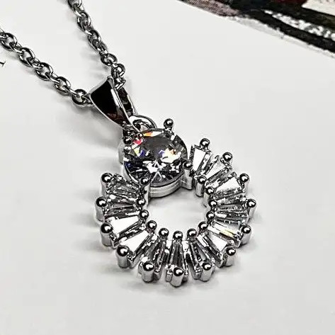 گردنبند و آویز زنانه جواهری طرح حلقه ای نگین تنیسی و تک نگین بزرگ ضد حساسیت رنگ کاملا ثابت کد atk (پس کرایه)