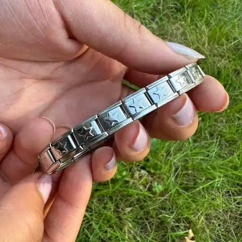 دستبند چارم یونیسکس (مردانه و زنانه) ستاره ای رنگ نقره ای استیل عیار 316 ضد حساسیت و رنگ ثابت کد zsf (پس کرایه)