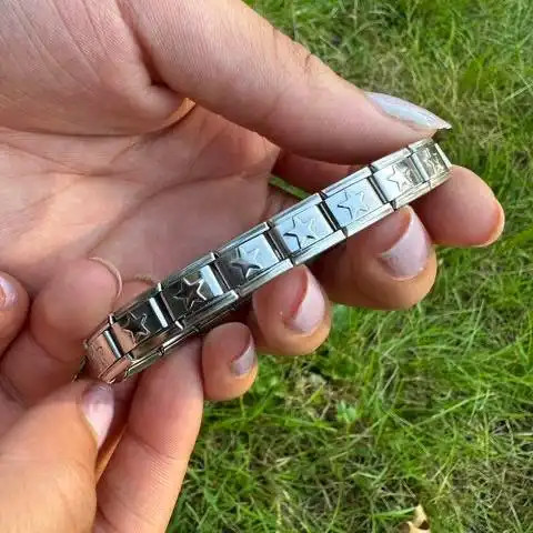 دستبند چارم یونیسکس (مردانه و زنانه) ستاره ای رنگ نقره ای استیل عیار 316 ضد حساسیت و رنگ ثابت کد zsf (پس کرایه)