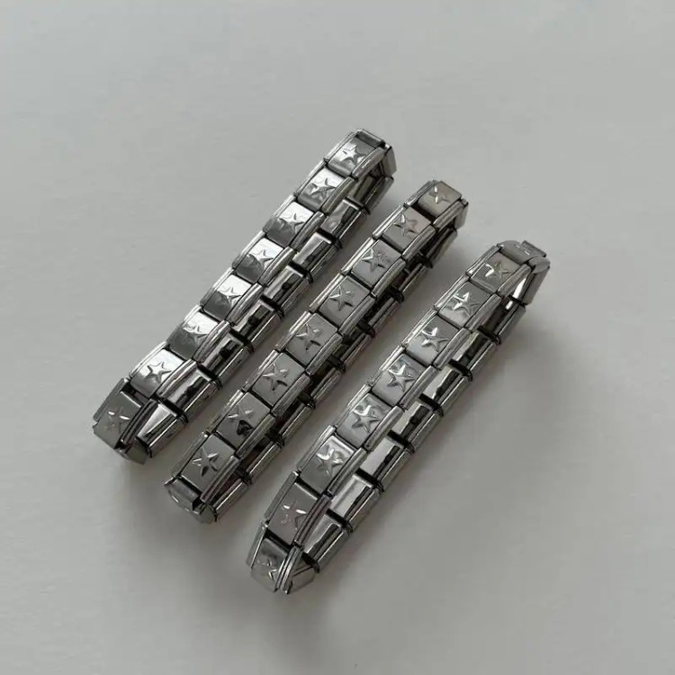 دستبند چارم یونیسکس (مردانه و زنانه) ستاره ای رنگ نقره ای استیل عیار 316 ضد حساسیت و رنگ ثابت کد zsf (پس کرایه)