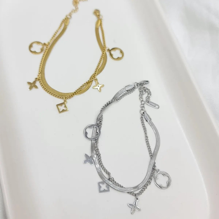 دستبند زنانه دولاین با چهار آویز متفاوت ونکلیف Vancleef رنگ طلایی و نقره ای آبکاری نقره رنگ ثابت کد zgg