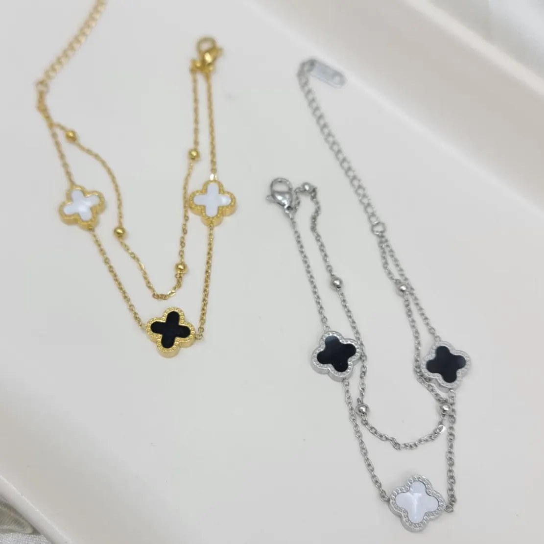 دستبند زنانه دولاین با آویز ونکلیف Vancleef رنگ طلایی و نقره ای آبکاری نقره رنگ ثابت کد zgg