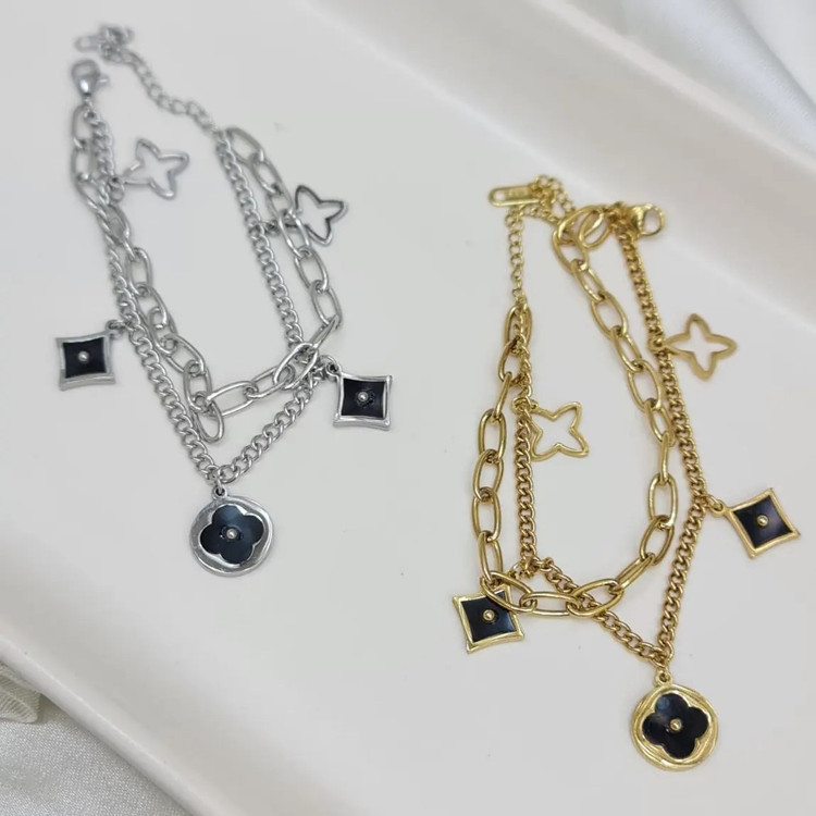 دستبند زنانه دولاین با پلاک ونکلیف Vancleef رنگ طلایی و نقره ای آبکاری نقره رنگ ثابت کد zgg