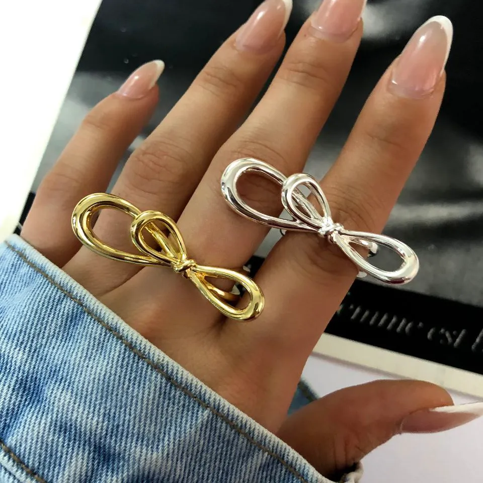 انگشتر زنانه گره پاپیونی رنگ طلایی و نقره ای آبکاری نقره رنگ ثابت فری سایز Freesize کد zsm (پس کرایه)