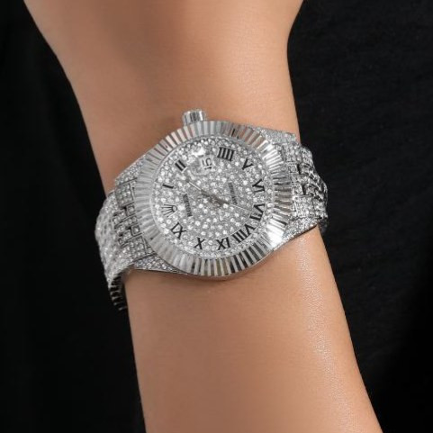 ساعت مچی زنانه طرح رولکس Rolex قفل پروانه ای نگین کار شده تقویم دار رنگ ثابت کد zmp (پس کرایه)