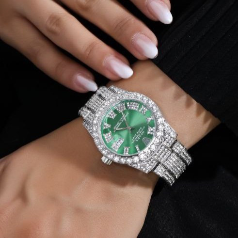 ساعت مچی زنانه طرح رولکس Rolex قفل پروانه ای فول نگین کار شده سیلور تقویم دار رنگ ثابت کد zmp (پس کرایه)