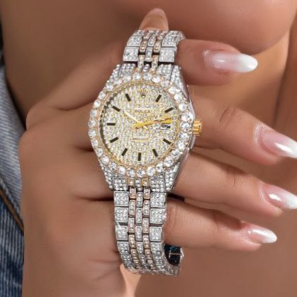 ساعت مچی زنانه طرح رولکس Rolex قفل پروانه ای فول نگین کار شده تقویم دار رنگ ثابت کد zmp (پس کرایه)