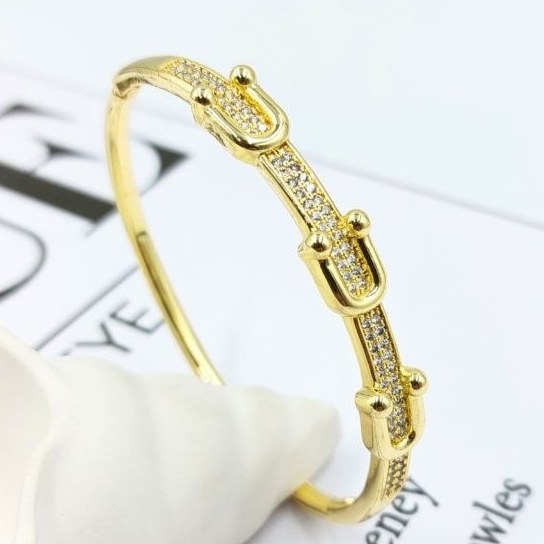 دستبند زنانه طرح تیفانی Tiffany نگین کاری شده فری سایز freesize رنگ ثابت کد zmp (پس کرایه)