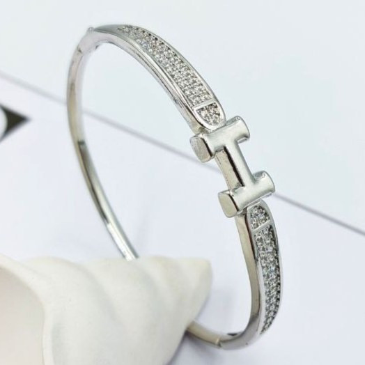دستبند زنانه طرح هرمس Hermes نگین کاری شده فری سایز freesize رنگ ثابت کد zmp (پس کرایه)