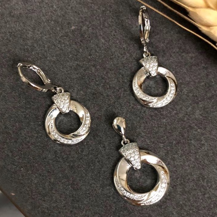 ست گردنبند و گوشواره جواهری زنانه طرح حلقه ای ضخیم پیچی نگین دار رنگ کاملا ثابت کد zsm (پس کرایه)
