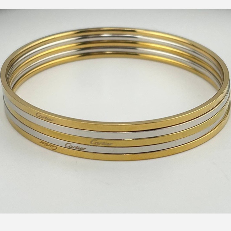 دستبند النگویی زنانه استیل آیینه ای طرح کارتیه Cartier پک 5 عددی رنگ کاملا ثابت کد zki (پس کرایه)