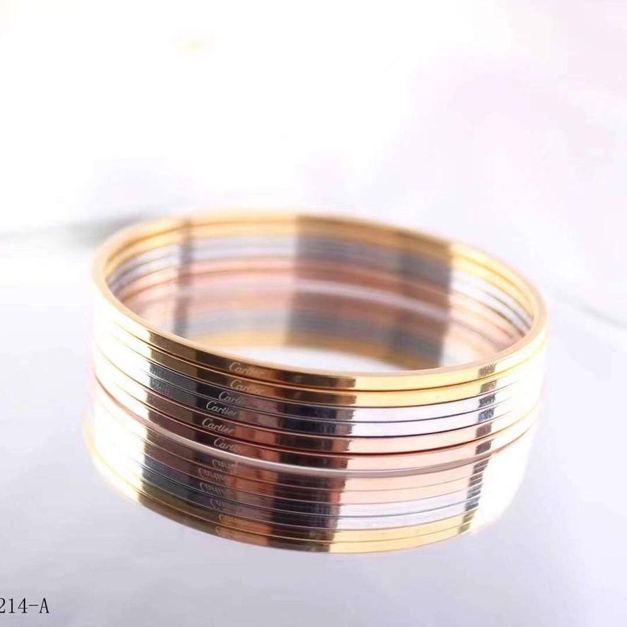 دستبند النگویی زنانه استیل آیینه ای طرح کارتیه Cartier پک 5 عددی رنگ کاملا ثابت کد zki (پس کرایه)