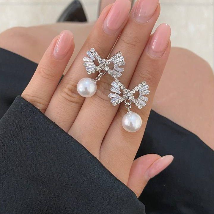 گوشواره زنانه طرح بال فرشته نگین و مروارید تنوع طرح رنگ کاملا ثابت کد tj (پس کرایه)