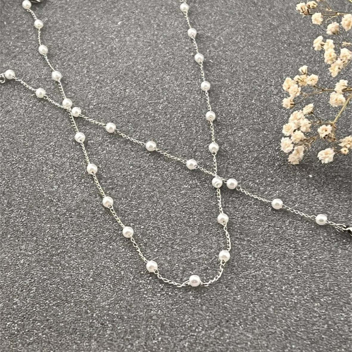 ست گردنبند و دستبند استیل زنانه طرح مرواریدی رنگ کاملا ثابت کد ki (پس کرایه)