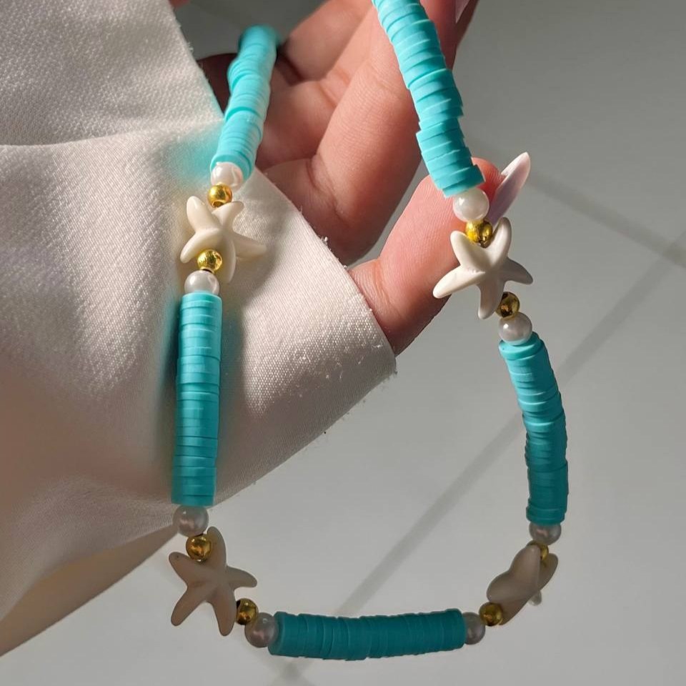 گردنبند زنانه طرح مهره ستاره دریایی تنوع طرح رنگ ثابت کد tk (پس کرایه)