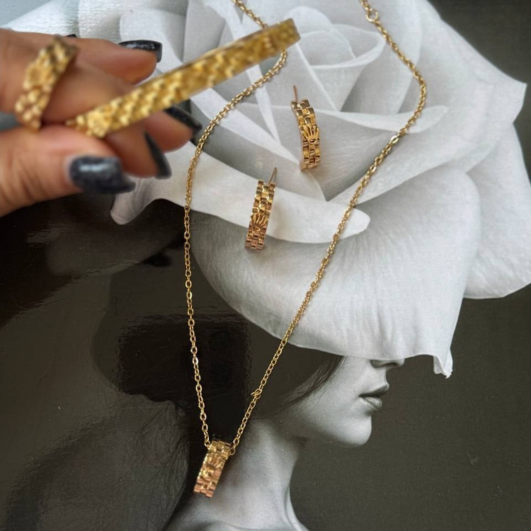 ست کامل گردنبند و دستبند و انگشتر و گوشواره استیل زنانه طرح رولکس Rolex رنگ ثابت کد sm (پس کرایه)