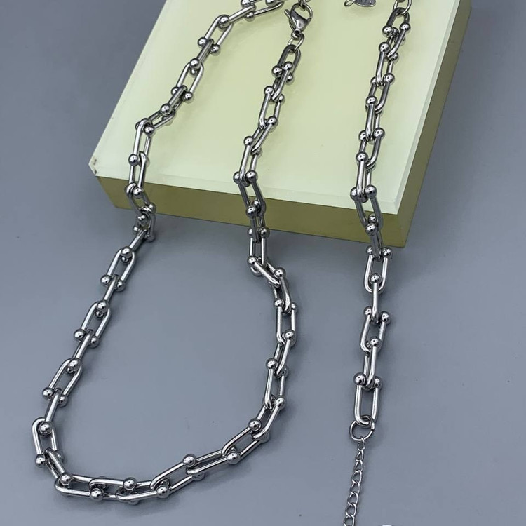 ست گردنبند و دستبند استیل زنانه طرح تیفانی طلایی و نقره ای رنگ ثابت کد el (پس کرایه)