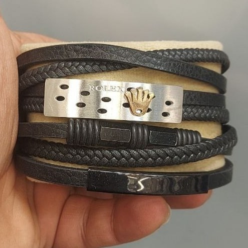 دستبند چرمی قفل و پلاک استیل مردانه طرح رولکس Rolex کیفیت چرم عالی تنوع طرح رنگ ثابت کد bn (پس کرایه)