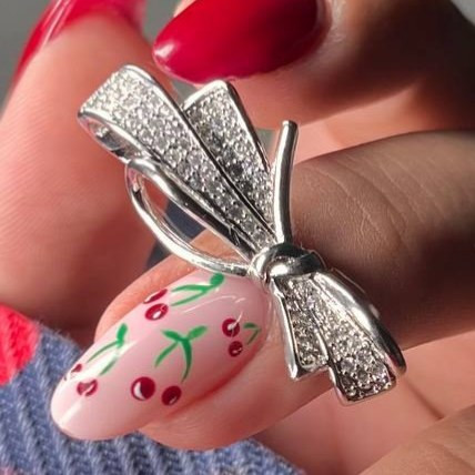 انگشتر طرح جواهری زنانه طرح پاپیون گره ای نگین رنگ ثابت کد tk