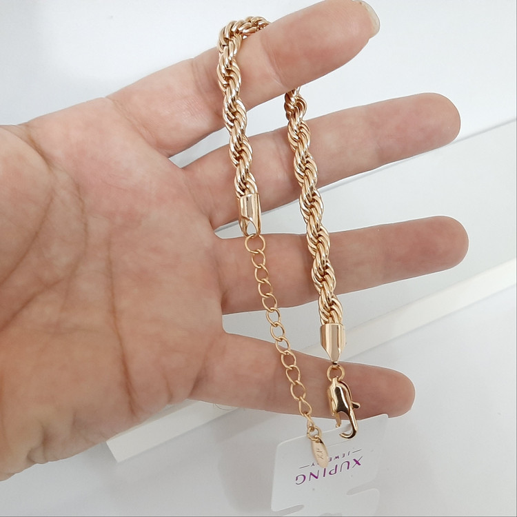 دستبند طنابی ژوپینگ کاملا رنگ ثابت حک خورده و آبکاری طلا شده ورق بزنید لطفا