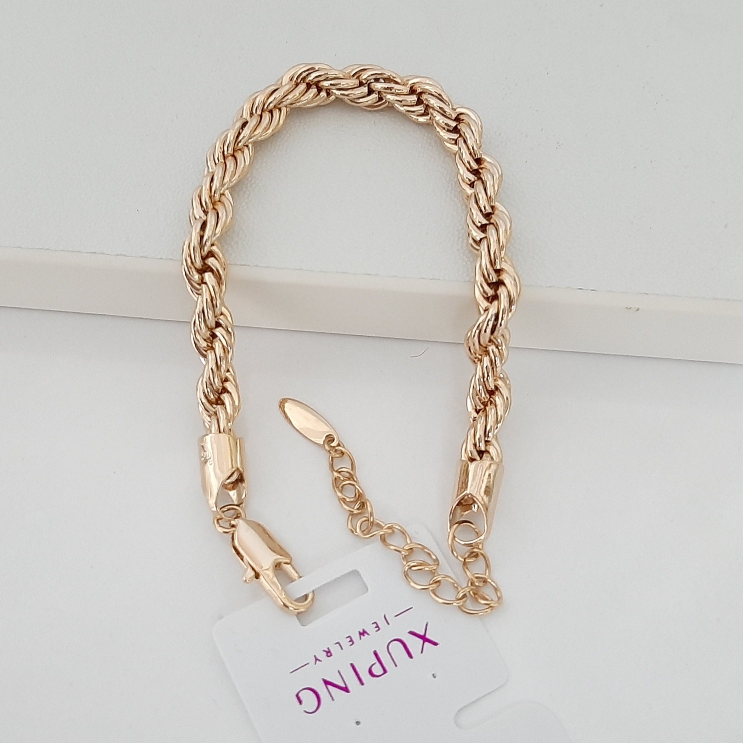 دستبند طنابی ژوپینگ کاملا رنگ ثابت حک خورده و آبکاری طلا شده ورق بزنید لطفا