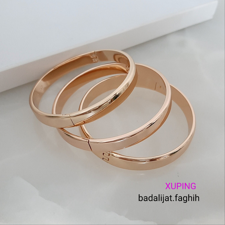 دستبند النگویی ژوپینگ دونه ای 1/200 حک خورده و رنگ ثابت با آبکاری طلا ورق بزنید