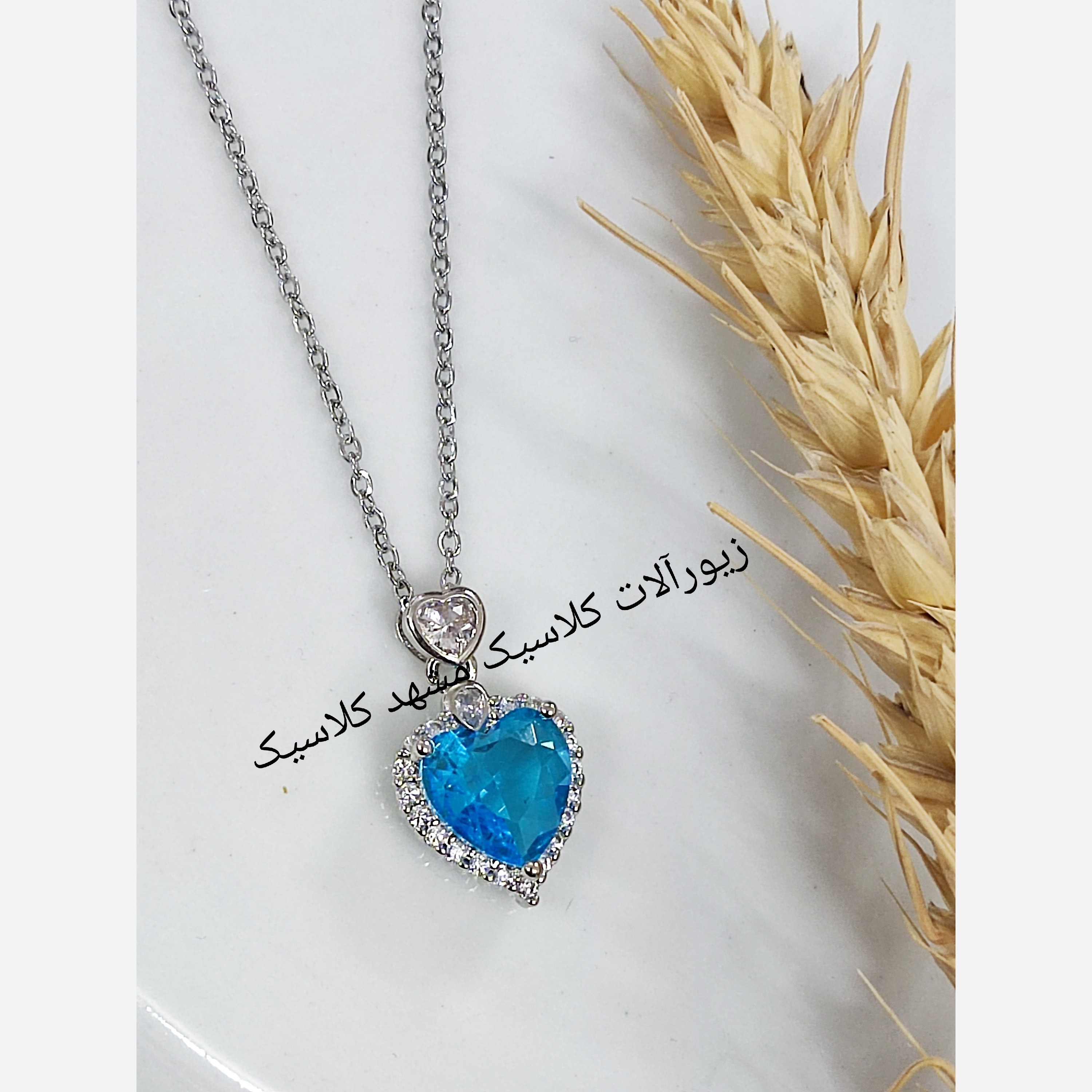 گردنبند استیل نگین طرح توپاز قلبی نقره ای
