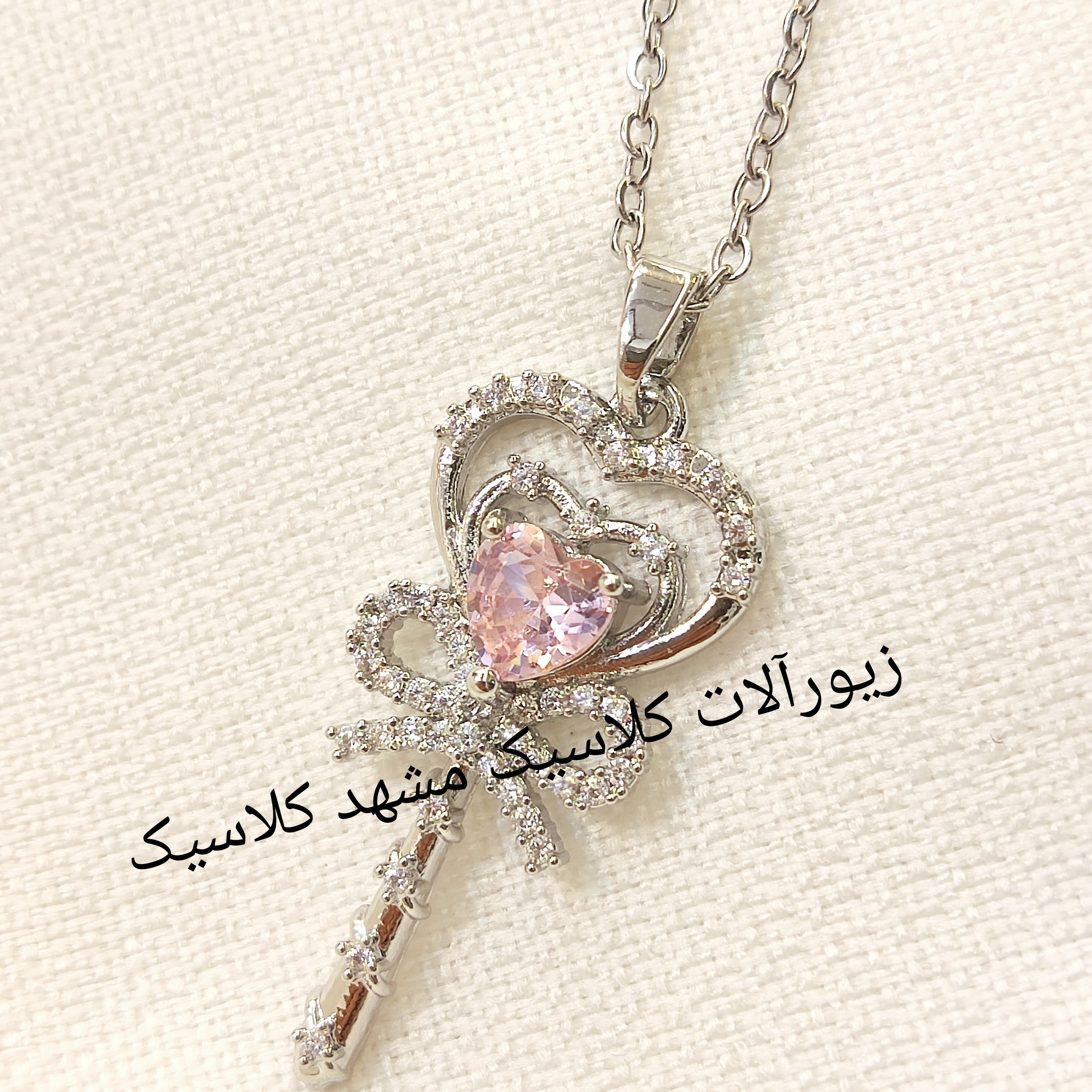 گردنبند نقره ای نگین صورتی استیل نقره ای رنگ ثابت