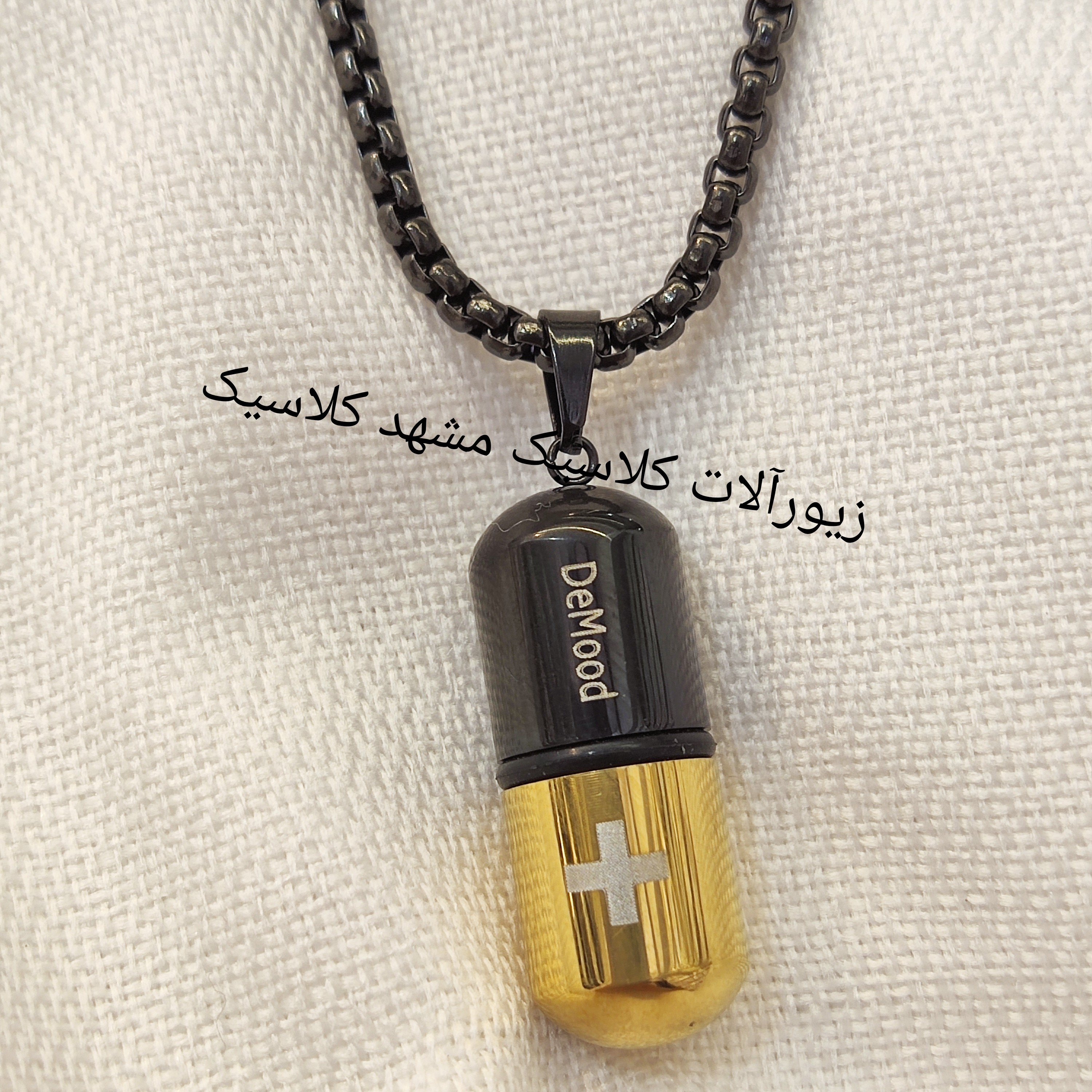 گردنبند کپسول دو رنگ مشکی طلایی استیل