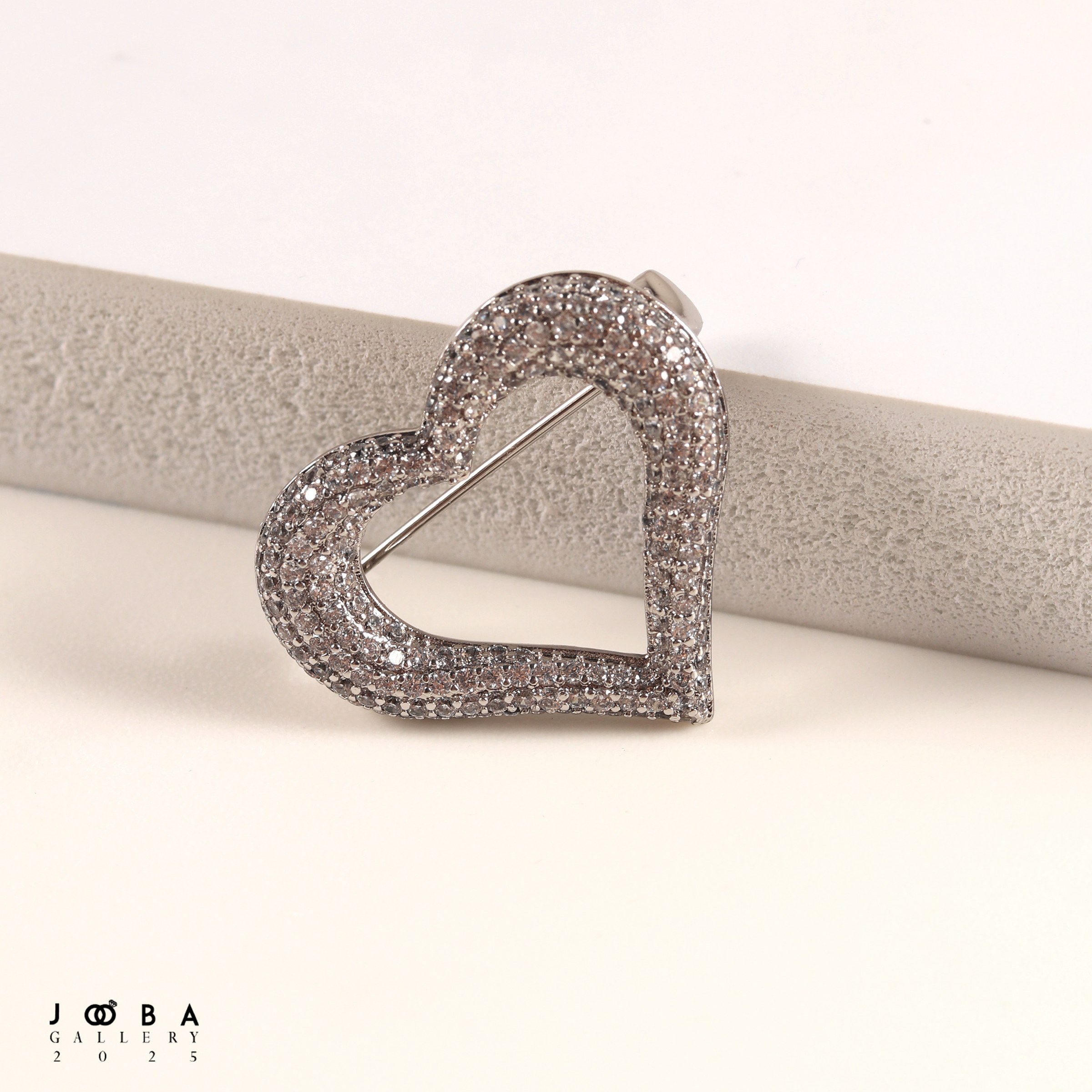 گل سینه قلبی طلایی و نقره ای برند ژوپینگ کد 1091391972
