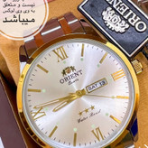 ساعت مردانه برند اورینت لوکس دو تقویمه استیل رنگ ثابت با تقویم فارسی و انگلیسی کیفیت عالی ORIENT