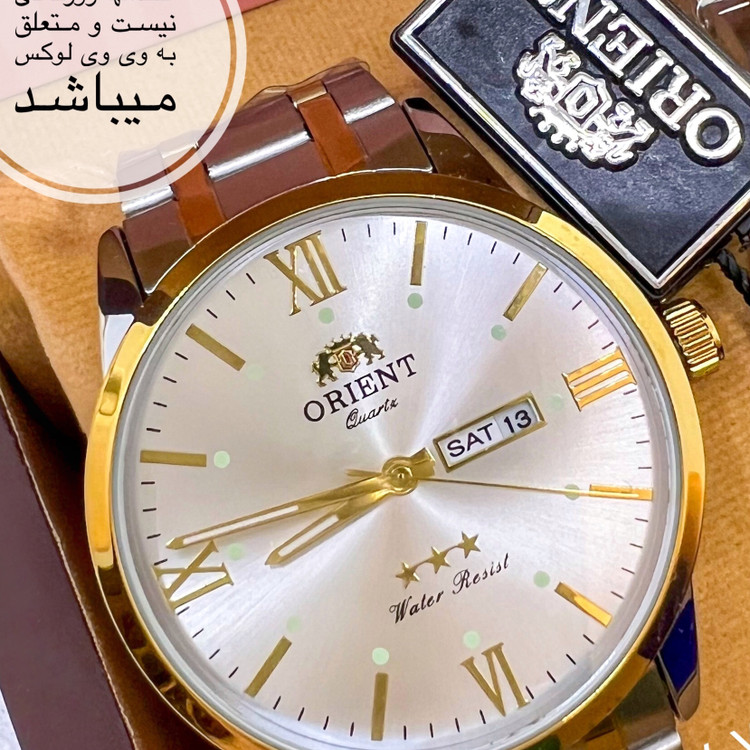 ساعت مردانه برند اورینت لوکس دو تقویمه استیل رنگ ثابت با تقویم فارسی و انگلیسی کیفیت عالی ORIENT