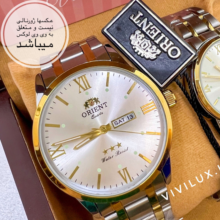 ساعت مردانه برند اورینت لوکس دو تقویمه استیل رنگ ثابت با تقویم فارسی و انگلیسی کیفیت عالی ORIENT