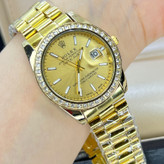 ساعت رولکس صفحه طلایی دور نگین قاب متوسط زنانه و مردانه خاص Rolex