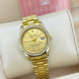 ساعت رولکس صفحه طلایی دور نگین قاب متوسط زنانه و مردانه خاص Rolex