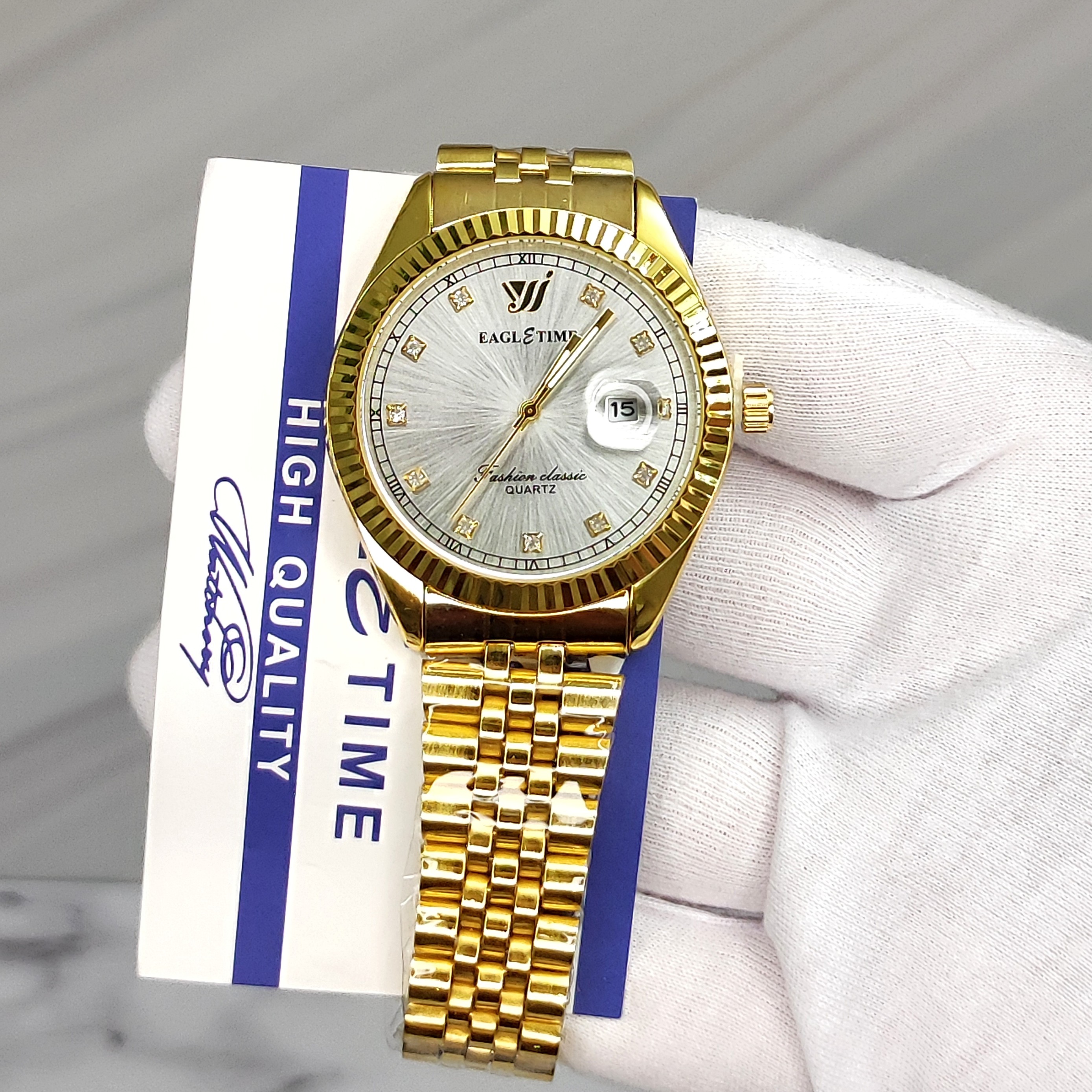 ساعت مردانه اورجینال کیفیت عالی برند EAGLE TIME طلایی با کارت اصالت برند