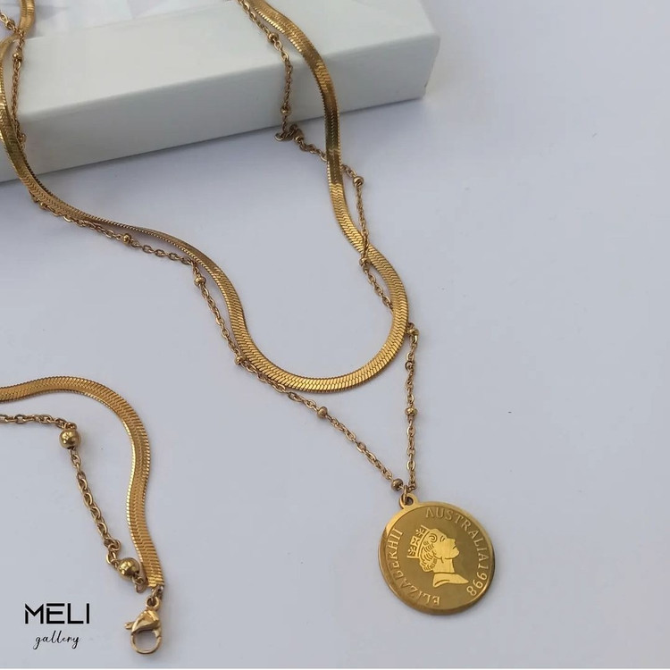 ست گردنبند دستبند استیل زنجیر ماری و توپی و آویز الیزابت طلایی رنگ ثابت (لاوین گالری)