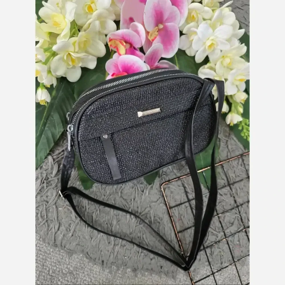 کیف زنانه آیدا جنس چرم طرح کنفی سه خونه (2)
