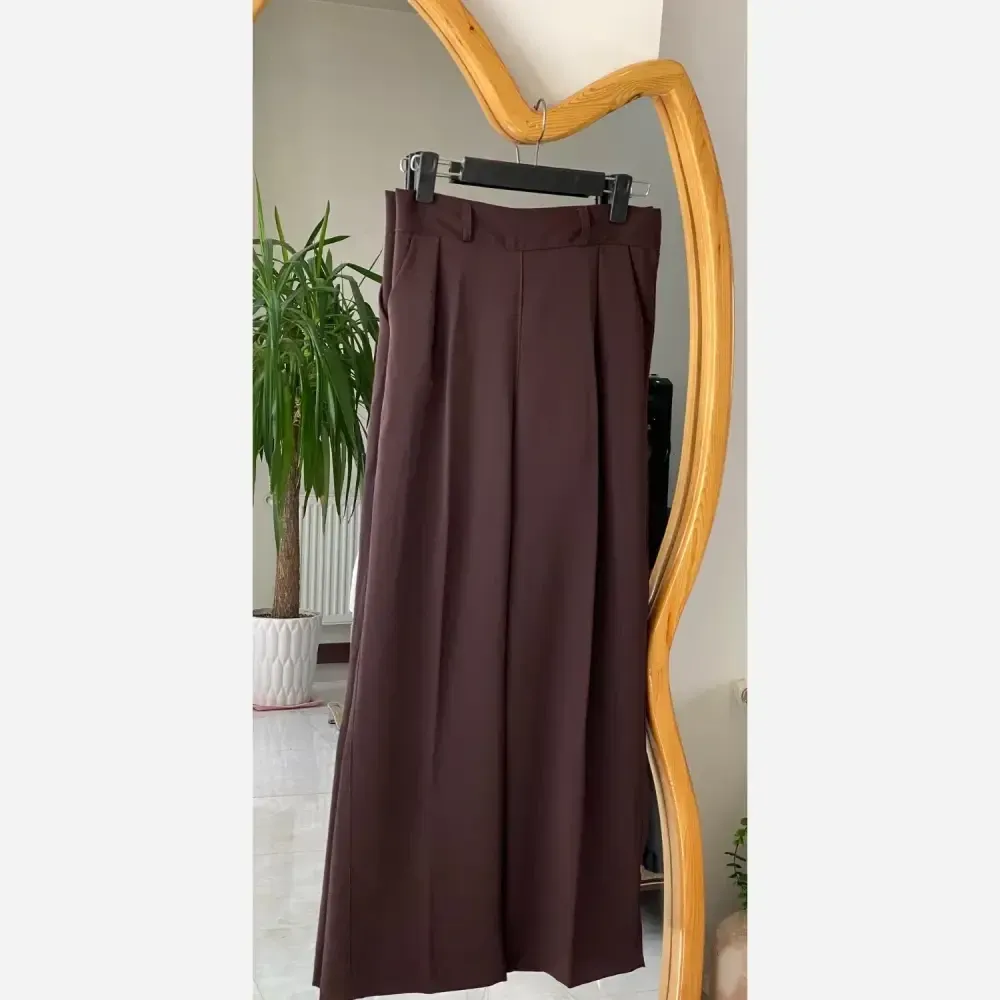 شلوار زنانه کرپ مورگان دمپا ریزشی مجلسی و روزمره جیبدار
