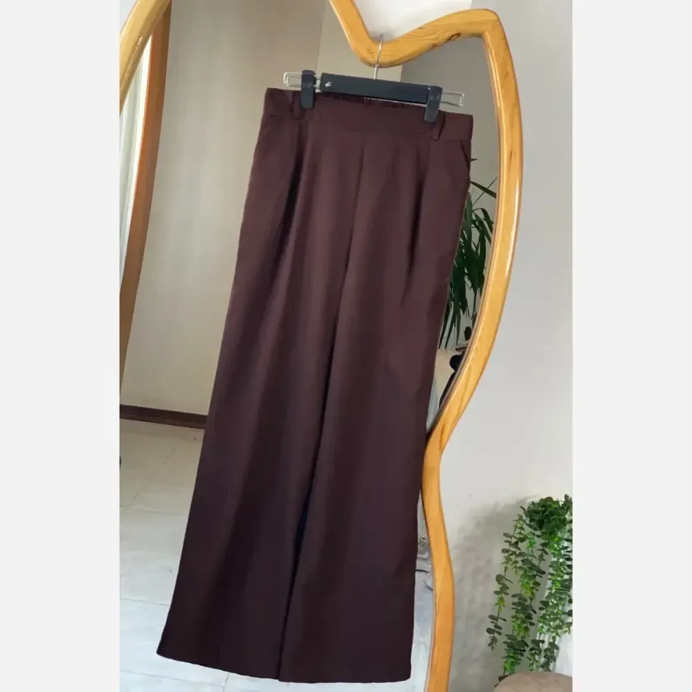 شلوار بگ زنانه جنس تنسل میله ای خنک و سبک در 4 رنگ متنوع سایز 44 تا 50